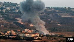 İsrail'in Lübnan'ın güneyinde İsrail sınırına yakın Khiam köyüne düzenlediği bombardıman sırasında yükselen dumanlar sınır ötesi gerilimi tırmandırıyor- 23 Haziran 2024.
